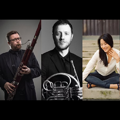 portraits of three musicians lined up in three columns. There are two men in formal wear holding their instruments and one smiling woman sitting on the ground